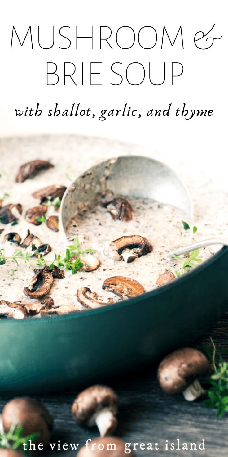 mushroom and brie soup with shallots, garlic, and thyme in a green pan