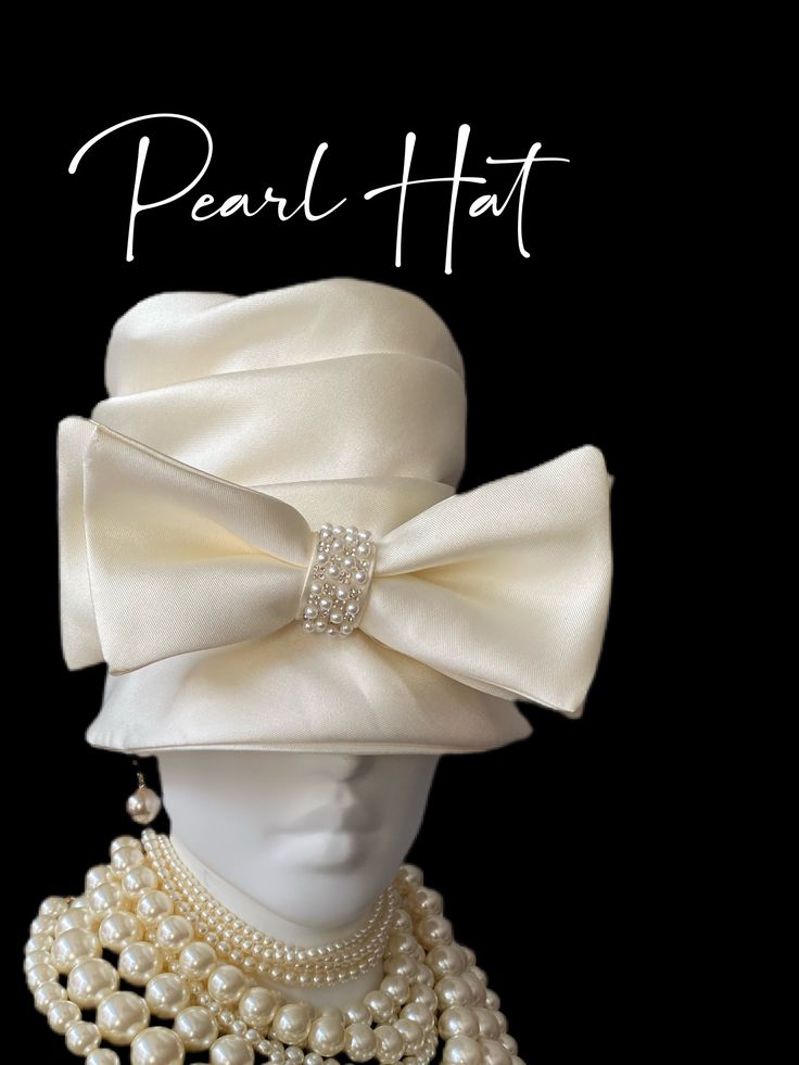 Satin fabric hat with a rhinestone bow. Perfect spring hat Elegant Jewelry With Ribbon For Wedding, Elegant Wedding Jewelry With Ribbon, Elegant Adjustable Jewelry With Satin Bow, Formal Handmade Hat With Curved Brim, Handmade Formal Hat With Curved Brim, Luxury Formal Hats With Structured Crown, Luxury Formal Hat With Structured Crown, Formal Wide Brim Hat With Ribbon, Wedding Hats With Bow And Short Brim