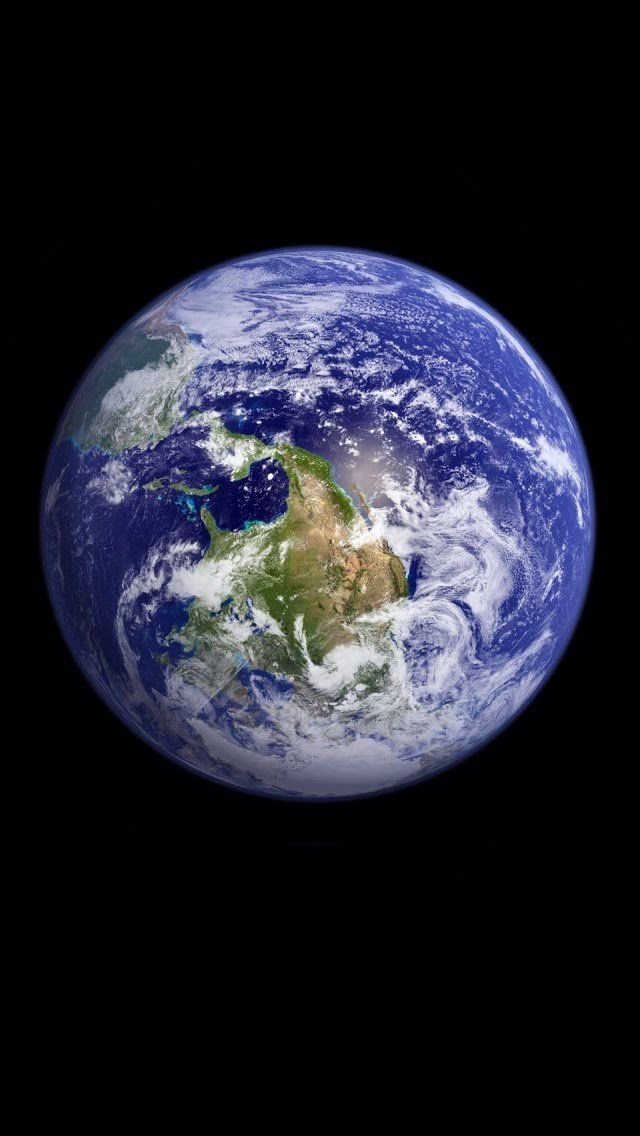 the earth as seen from space showing australia and new zealand on black background stock photo