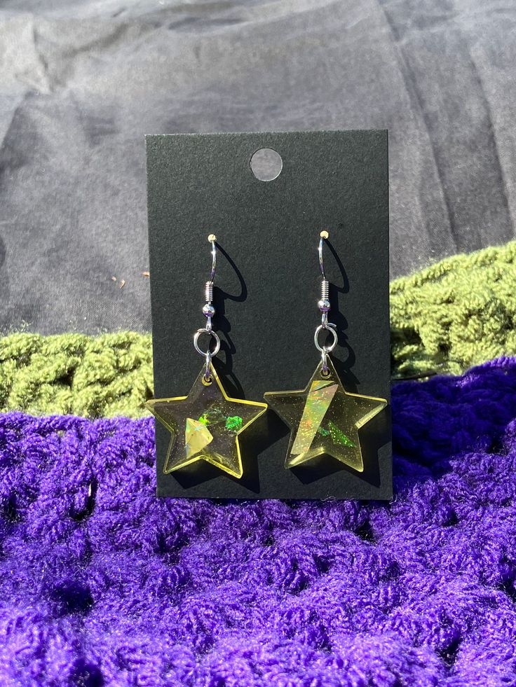 Small Star Earrings    Materials    Resin    Holographic bits    Jump rings    Earrings hooks Green Star Earrings For Pierced Ears, Star-shaped Nickel-free Plug Earrings As Gift, Star-shaped Nickel-free Plug Earrings For Gift, Nickel-free Star Shaped Plug Earrings For Gift, Star Shaped Nickel Free Plug Earrings For Gift, Star-shaped Pierced Earrings As Gift, Star-shaped Pierced Earrings For Gifts, Star Shaped Pierced Earrings For Gifts, Star-shaped Crystal Earrings For Gifts