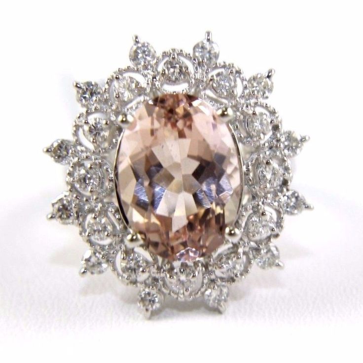 This Is A Fancy Fine Huge Oval Cut Morganite Cocktail Ring W/Diamond Spiderweb Halo. It Is Made Of 100% Natural 14kt White Gold And Is In Brand New Condition. It Has A Ctw Of 7.8ct And Weighs 7.8 Grams. The Fancy Diamonds Have A Clarity Of Si2 And G Color. This Beautiful Custom Piece Has An Excellent Oval Cut Morganite Stone, Surrounded By A Diamond Spiderweb Style Halo. This Ring Is The Latest In Fashion Design Having Unique Designer Qualities That Is Full Of Shine And Clarity. It Comes With A Exquisite Formal Morganite Ring, Formal Morganite Diamond Ring With Diamond Accents, Classic Morganite Diamond Ring For Formal Occasions, Formal Morganite Diamond Ring With Accents, Elegant Morganite Ring For Formal Occasions, Elegant Morganite Rings For Formal Events, Formal Morganite Diamond Ring With Center Stone, Formal Morganite Diamond Ring In Fine Jewelry Style, Heirloom Morganite Diamond Ring For Formal Occasions