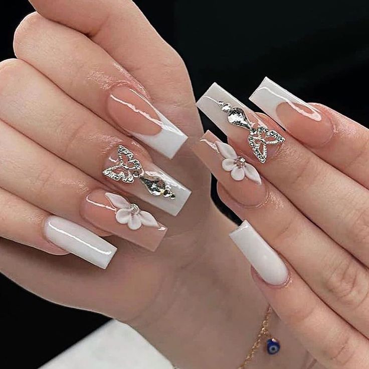 PRICES MAY VARY. 🦋【Effortless Nail Transformation】: Elevate your nail game effortlessly with our acrylic press-on nails kit. This set includes 24 medium-length square-shaped nails that are perfect for DIY nail enthusiasts. 🦋【Elegant and Versatile Design】: Our nails feature a stunning combination of white and nude shades, adorned with delicate butterfly rhinestones and floral designs. This unique and stylish design adds a touch of elegance to any look or occasion. 🦋【Complete Set for Easy Appli Nails Jelly, Nail Kits, Fake Nails Long, Nagel Tips, Manicure Tips, Nail Type, Coffin Press On Nails, Nails Set, White Nail