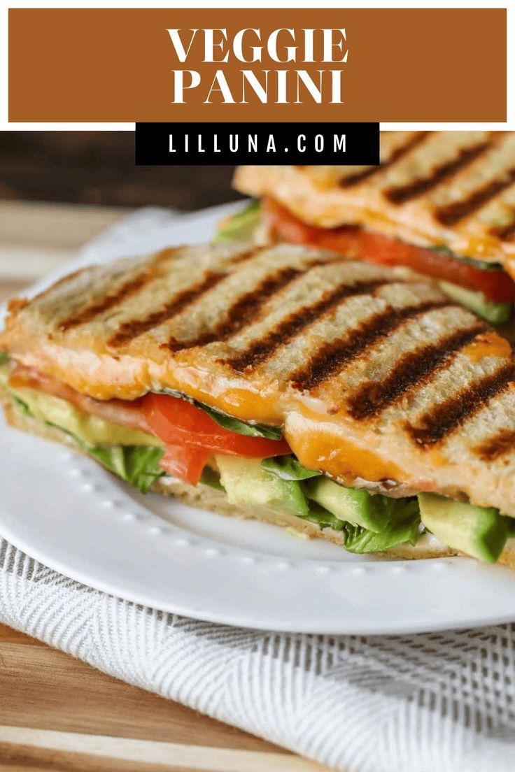 grilled veggie panini on a white plate