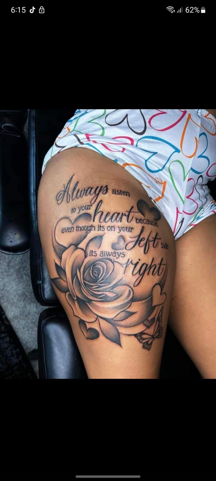 a woman's thigh with tattoos on it and the words, always in your heart