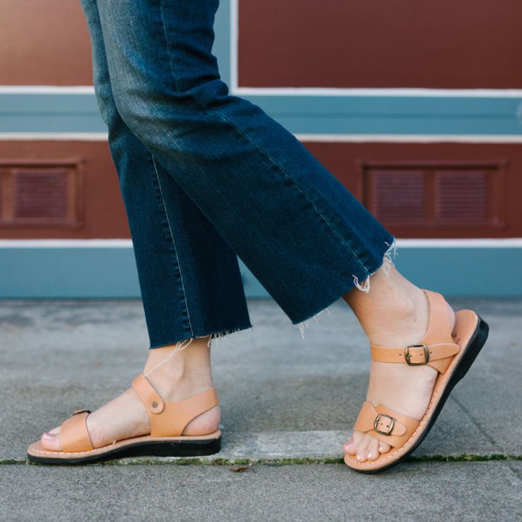 Step into history with The Original - the handcrafted women's sandal that started it all. These two-buckle sandals boast timeless style, unbeatable comfort, and Old World craftsmanship. Customize your perfect fit with adjustable buckles at the ankle and toes. The 100% vegetable-tanned leather insole conforms to the unique contours of your footprint with every stride, while the straps soften and develop a rich patina over time. Experience resilience and comfort in any adventure with these water-r Summer Beach Sandals With Brass Buckle, Summer Open Toe Sandals With Brass Buckle, Brown Sandals With Brass Buckle, Leather Sandals With Brass Buckle And Single Toe Strap, Natural Color Closed Toe Sandals With Buckle Closure, Summer Toe Loop Sandals With Tang Buckle, T-strap Toe Ring Sandals With Buckle Closure, Toe Loop Sandals With Tang Buckle For Summer, Adjustable Open Toe Sandals With Brass Buckle