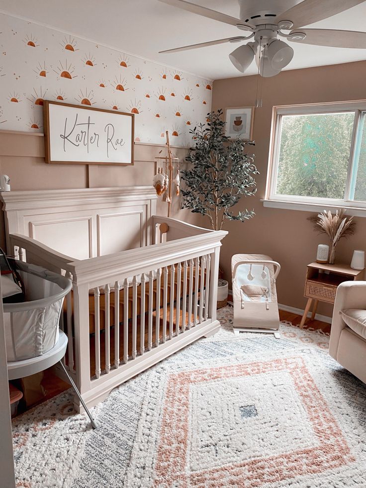 a baby's room with a crib, rocking chair and rug in it