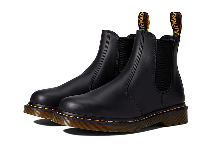 Dr. Martens 2976 - Boots : Black Nappa : This classic Dr. Martens 2976 boot will do well keeping your feet in style and in total comfort in the big city. Slip-on Chelsea boot. Smooth leather is a firm, finished leather with a smooth, semi bright appearance. Side elastic gusset for easy on and off and a comfortable fit. Back heel loop. Smooth textile lining. Lightly cushioned footbed for underfoot comfort. Goodyear welted construction offers exceptional flexibility. Air-cushioned outsole is oil a Dc Marten, Dr Martens Chelsea, Dr Martens 2976, Black Chelsea Boots, Leather Chelsea Boots, Goodyear Welt, Big City, Chelsea Boot, Lace Boots