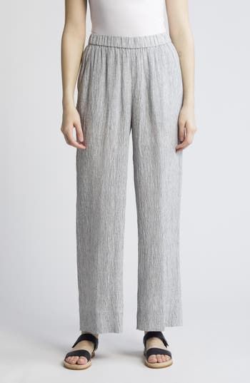 Refresh your warm-weather look with these casual pants cut from lightweight organic linen that's wash to give it a crinkled texture. 29 1/2" inseam Elastic waist 100% organic linen Machine wash, line dry Imported Linen Wide Leg Pants, Wide Leg Linen Pants, Organic Linens, Eileen Fisher, Bottoms Pants, Warm Weather, Leg Pants, Wide Leg Pants, Casual Pants