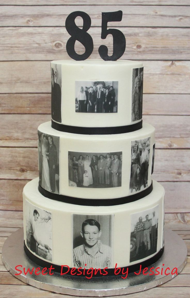 a three tiered cake decorated with photos and the number 855 on it's side