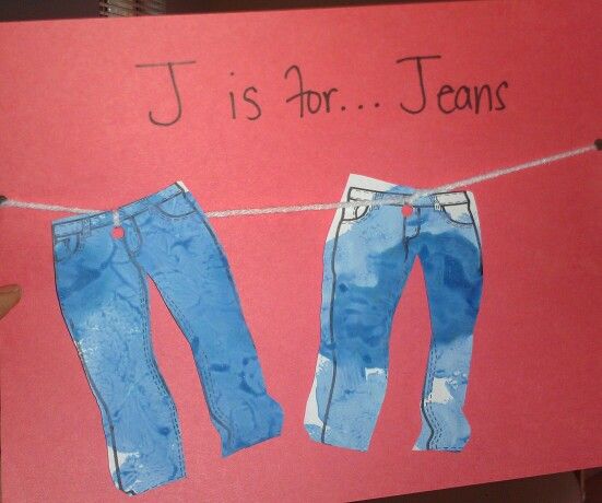 a handmade card with jeans hanging on a clothes line and the words j is for jeans