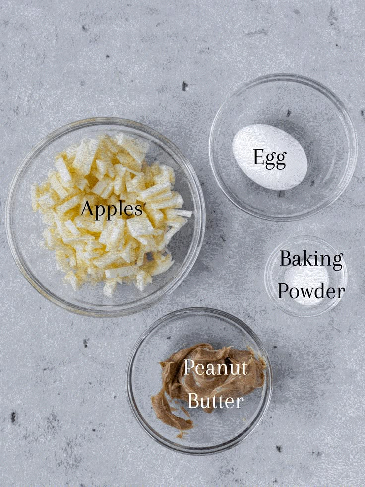 ingredients for apple pie in glass bowls on a white background with the words apples baking powder, peanut butter and egg yogurt