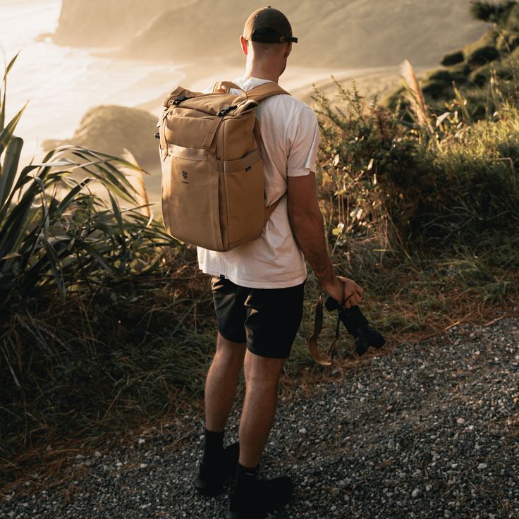 The Weekender Backpack With Camera Cube is a low profile designed backpack for the content creator and photographer, and with the camera cube removed, it's equally at home as an every day backpack.This versatile camera backpack has two compartments, the lower compartment holds the removable camera cube, with the upper compartment for every day items such as clothing, books, etc. Unzipping the internal divider transforms the Weekender from a dedicated camera bag to an everyday bag - perfect for u Travel Camera Bag With Zipper, Crossbody, Versatile On-the-go Camera Bag Pouch, Brown Camera Bag With Removable Pouch For On-the-go, Functional Camera Bag For On-the-go, On-the-go Rectangular Camera Bag With Adjustable Strap, Day Backpacks, Camera Backpack, Everyday Backpack, Lifestyle Design