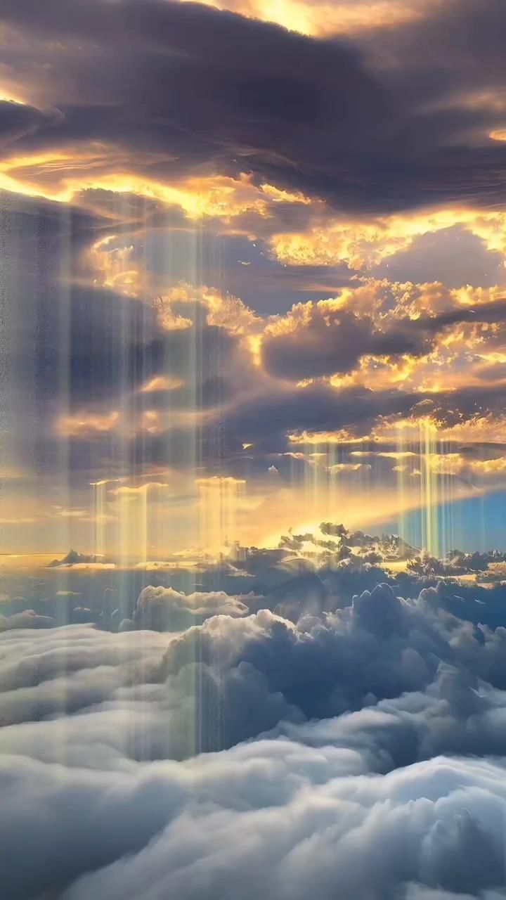 the sky is filled with clouds and sun beams