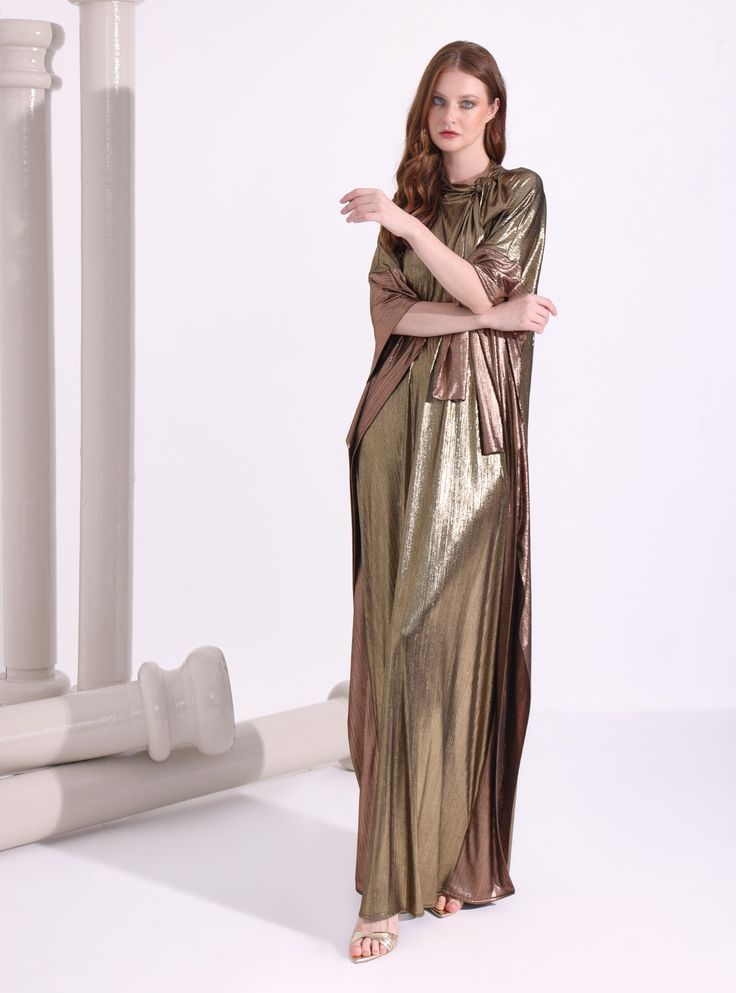 WF ATELIERMat Mat gold relax fit evening out kaftan Fabric: 100% Polyester The model wears size One size and is 177 cm tall. Garment length: 145 cm Gold Floor-length Kaftan For Festive Occasions, Gold Maxi Length Kaftan For Festive Occasions, Gold Maxi-length Kaftan For Festive Occasions, Festive Gold Maxi Length Kaftan, Festive Floor-length Gold Kaftan, Festive Gold Floor-length Kaftan, Gold Floor-length Abaya, Gold Kaftan For Party And Festive Occasions, Elegant Gold Maxi Kaftan