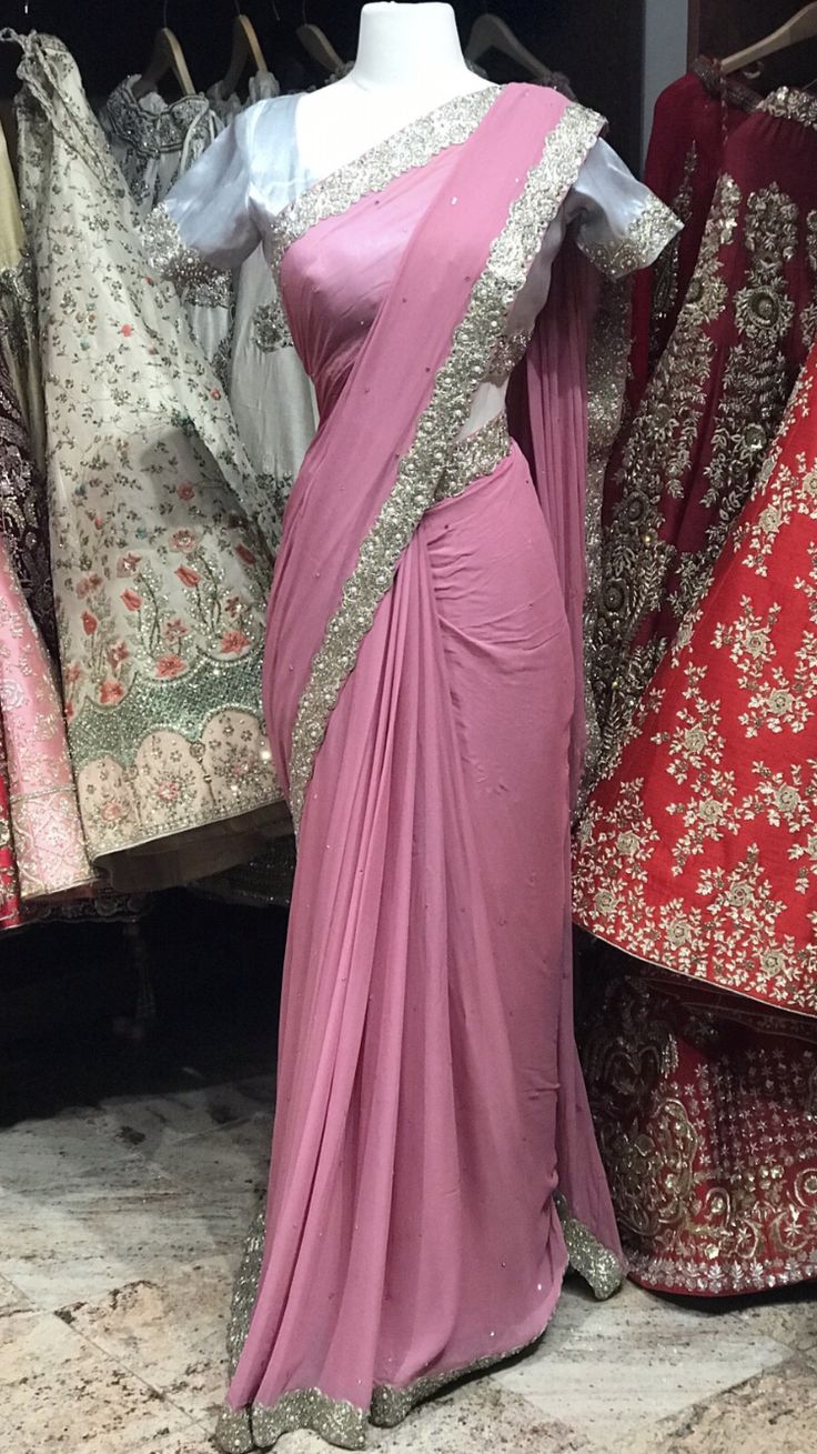 Custom Order this beautiful Pink Bridesmaid Saree! Our bridesmaids outfits can be customized in multiple colors and specific to client measurements. They require 120 days of production time and are for bulk orders only! Orders are processed in store only! Minimum Order Quantity- 4 pieces Cheap Pink Wedding Saree, Traditional Floor-length Pink Saree, Traditional Embroidered Pink Saree, Pink Traditional Saree, Festive Pink Saree With Border, Exclusive Saree Blouse Designs, Cultural Clothes, Bridesmaids Outfits, Latest Bridal Blouse Designs