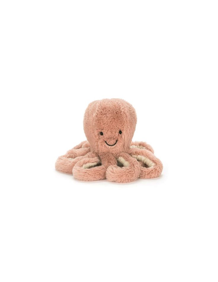 an octopus stuffed animal on a white background