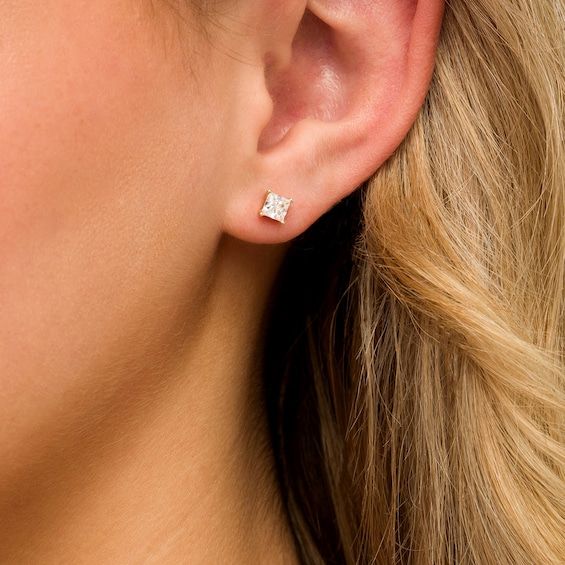 Celebrate any occasion with these shimmering diamond stud earrings. Fashioned in 14K gold, each earring showcases a sparkling 1/2 ct. princess-cut diamond solitaire. Dazzling with 1 ct. t.w. of diamonds and a bright polished shine, these post earrings secure comfortably with screw backs. Hypoallergenic Diamond White Diamond Earrings, Fine Jewelry Princess Cut Diamond Earrings With Accents, Diamond White Princess Cut Diamond Earrings, Princess Cut Brilliant Earrings In Fine Jewelry, Princess Cut Cubic Zirconia Diamond Earrings, Princess Cut Diamond White Diamond Earrings, Princess Cut Diamond Earrings Fine Jewelry, Princess Cut Diamond Earrings For Gift, Princess Cut Diamond Earrings With Prong Setting