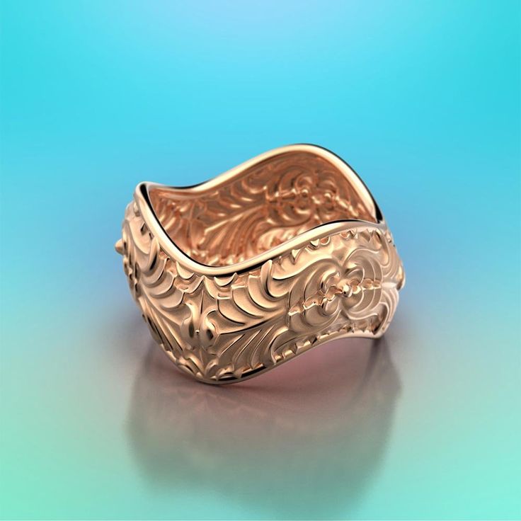 Elevate your style with Italian craftsmanship and the timeless beauty of our 14k or 18k gold wavy-loop ring. Adorned with an exquisite acanthus leaf pattern encircling the band, this ring is a true masterpiece of elegance. 14k or 18k Gold Size :13 mm wide on the top, 2.5 mm thick Deco style designed and crafted in Italy Elegant Rose Gold Dome Ring For Formal Occasions, Elegant Rose Gold Engraved Ring For Formal Occasions, Luxury 14k Gold Filigree Promise Ring, Rose Gold Engraved Open Ring For Formal Occasions, Elegant Rose Gold Wide Band Jewelry, Formal Rose Gold Engraved Open Ring, Luxury Rose Gold Open Engraved Ring, Luxury Engraved Rose Gold Open Ring, Elegant 14k Gold Jewelry With Wide Band