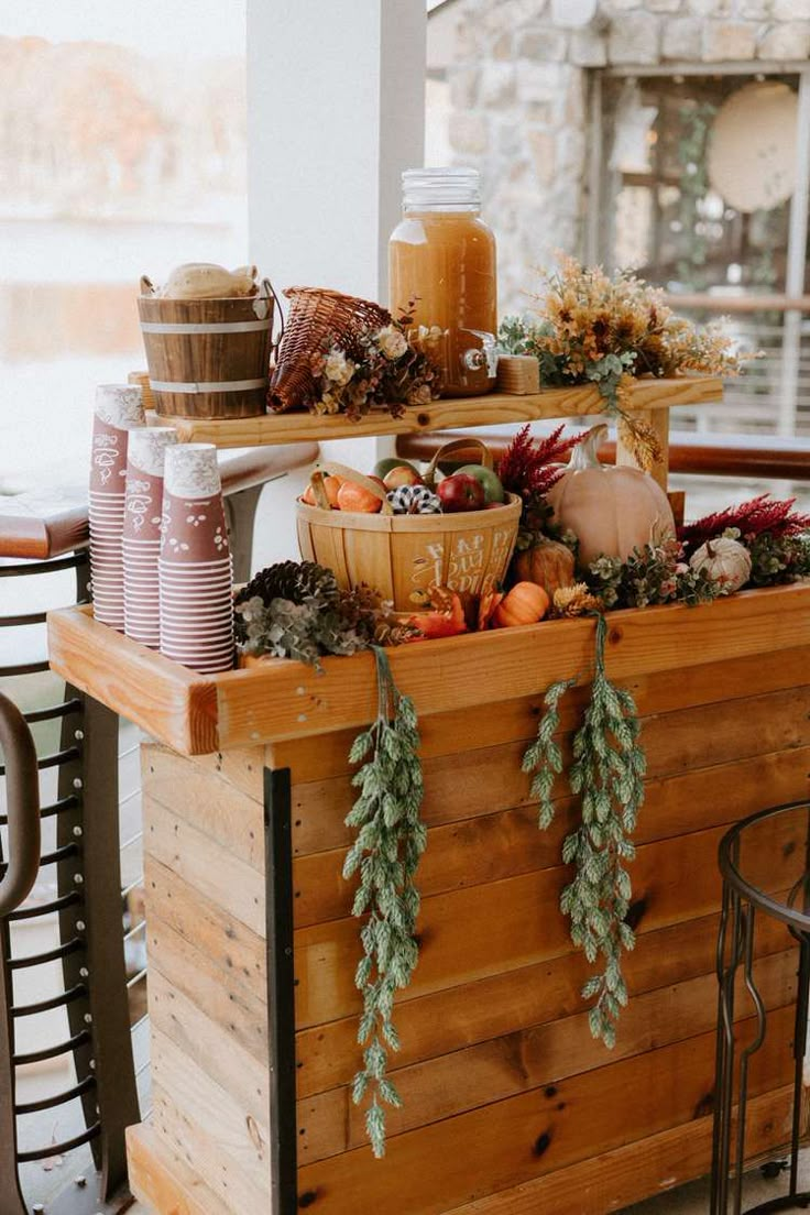 a wooden table topped with lots of food