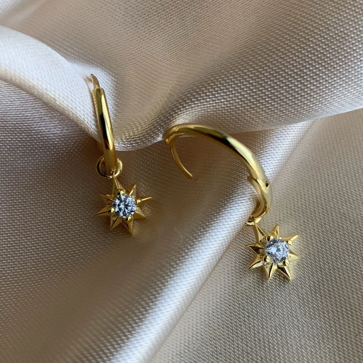 14K Gold plated 925 Sterling Silver Star hoop earrings. Minimalist style. Everyday jewelry made with love. ...............................DETAILS• 14K Gold Plated • 925 Sterling Silver • AAA Cubic Zirconia Stone• Also available in 14K White Gold...............................MEASURESHoop Diameter: 16mm (1.6cm) Charm Size:10mm (1cm) Gold Plated Star Hoop Earrings Tarnish Resistant, Gold Plated Star Hoop Earrings, Star-shaped Tarnish Resistant Hoop Earrings For Everyday, Celestial Yellow Gold Tarnish-resistant Hoop Earrings, Gold Plated Hoop Earrings With Star Charm, Gold Celestial Dangle Huggie Earrings, Gold Celestial Huggie Earrings For Everyday, Everyday Gold Star-shaped Hoop Earrings, Celestial Gold Plated Tarnish Resistant Hoop Earrings