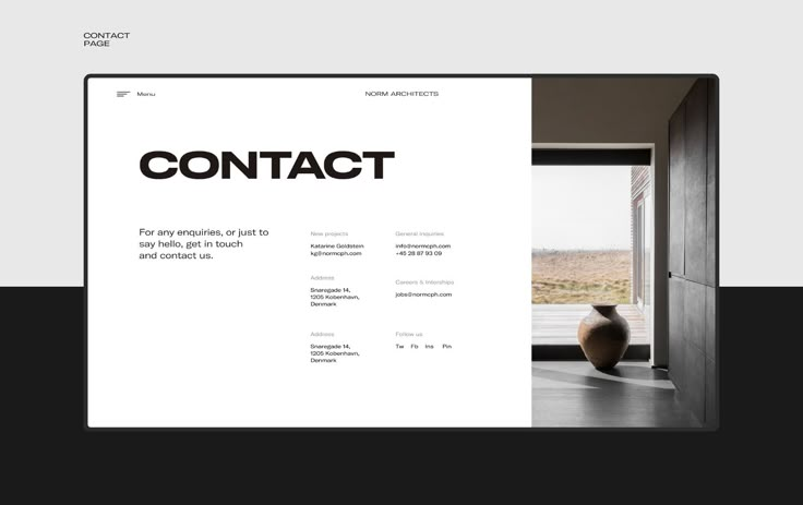 a white and black web page with the word contact on it's front cover