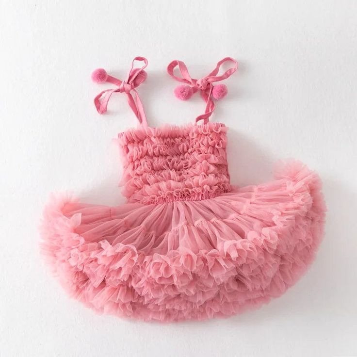 Celebrate your baby girl's milestones and special occasions with our Baby Girl Tutu Cake Dress. This exquisite dress is the epitome of sweetness and elegance, designed to make your little princess stand out. Crafted with high-quality materials, it features a fluffy mesh halter design that combines both comfort and style, ensuring your baby girl feels as good as she looks.The dress is adorned with layers of soft, fluffy mesh, creating a voluminous tutu effect that's both adorable and majestic, re Tutu Cake, Tutu Cakes, Sew Crafts, Pink Tools, Birthday Tutu Dress, Newborn Tutu, Princess Tutu Dress, Cake Dress, Kids Closet