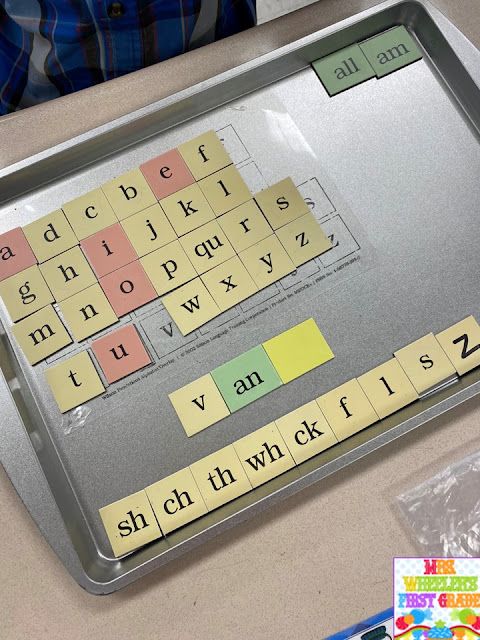 a metal tray with letters and numbers on it