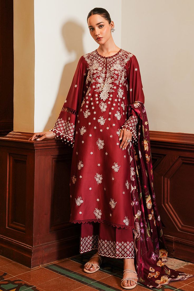 Product Details SHIRT100% cotton satin embroidered shirt front and sleevesDyed backTROUSERCambric dyed trouserDUPATTA Staple woolen printed dupatta ATTRIBUTE This elegant 3-piece satin suit boasts a 100% cotton shirt with exquisite embroidered detailing on the front and sleeves. The dyed back and cambric trouser add sophistication to this ensemble. Complete the look with the beautifully printed dupatta. Expertly crafted for a timeless appeal. Designer Winter Dresses, Satin Suit, Desi Outfits, Pakistani Suits Online, Embroidered Suit, Unstitched Dress Material, Cross Stitch Collection, Printed Dupatta, Chiffon Collection