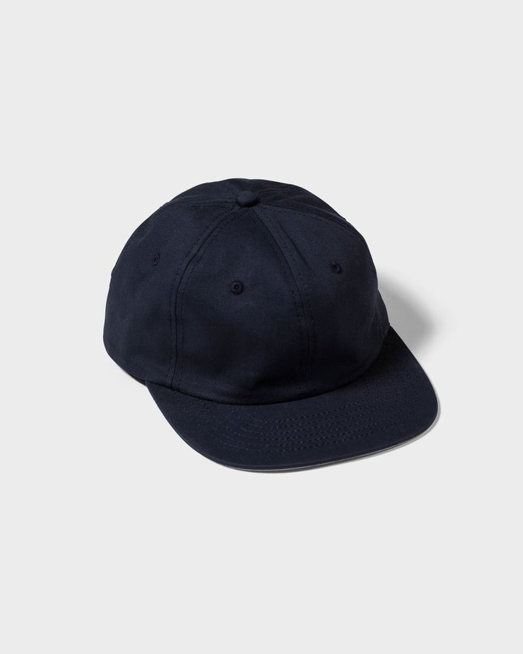 Description Size & Fit Care Shipping & Policies The Rue Cap features an unstructured, low-profile crown and flat brim with a contrast grey under-brim inspired by on-field baseball caps from the 1990s. Made from organic cotton twill. Designed, cut, and sewn in Canada.Fit: One size fits mostDetails: Six-panel, unstructured, low-profile crown, sewn eyelets, tonal stitching, slide clasp back closureMaterial: 100% organic cottonOrigin: Made in CanadaAlso available in Black and Natural. One size fits Sporty Cotton Dad Hat With Flat Bill, Navy Flat Brim Baseball Cap For Streetwear, Navy Baseball Cap With Flat Bill For Streetwear, Navy Flat Bill Baseball Cap For Streetwear, Navy Cotton Six-panel Hat, Everyday Solid Six-panel Dad Hat, Solid Color Everyday Six-panel Baseball Cap, Navy Cotton Baseball Cap With Curved Brim, Navy Flat Brim Baseball Cap