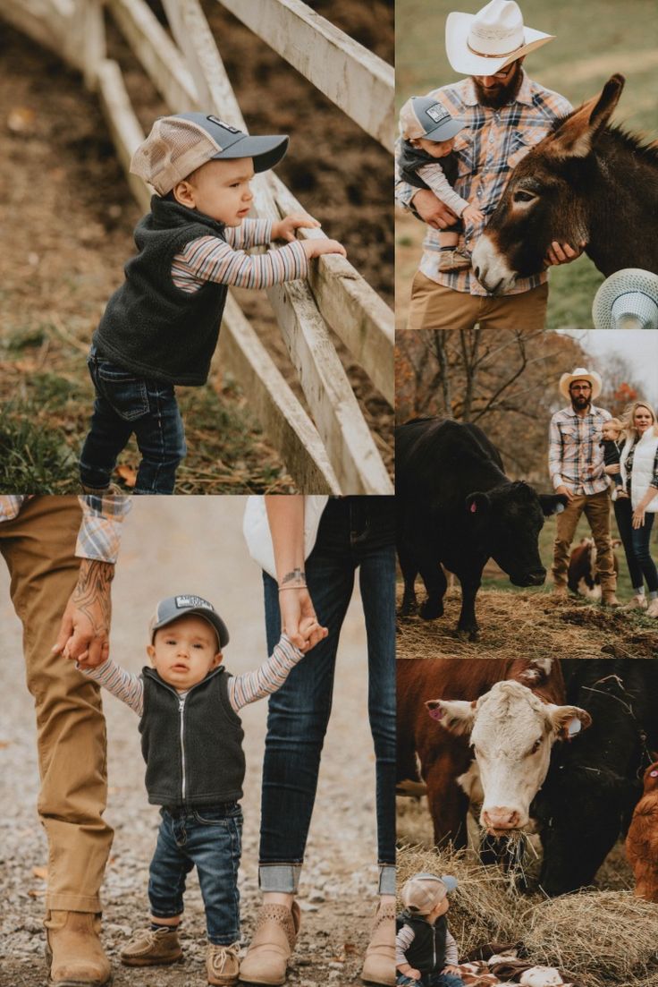 a couple of people that are standing in front of some animals and one is holding the hand of a child