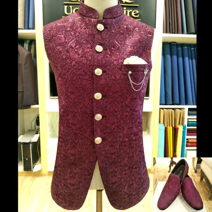 Description Get this classic look embroidered fabric waistcoat with gold brass buttons and brooch along with matching pocket square. Designer Nehru Jacket For Semi-formal Occasions, Elegant Embroidered Designer Nehru Jacket, Elegant Embroidered Nehru Jacket For Designer Wear, Elegant Wedding Vest With Buttons, Festive Semi-formal Sets With Buttons, Elegant Nehru Jacket With Zari Work For Designer Wear, Elegant Sleeveless Nehru Jacket For Festive Occasion, Elegant Embroidered Festive Vest, Elegant Festive Sets With Buttons