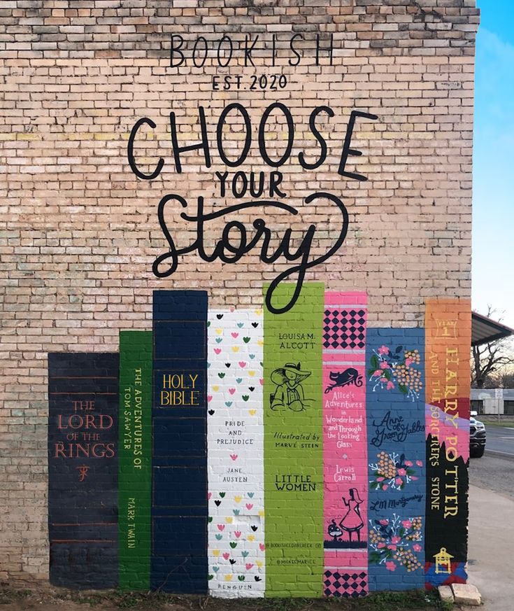 a brick wall with several books on it and the words choose your story written in black