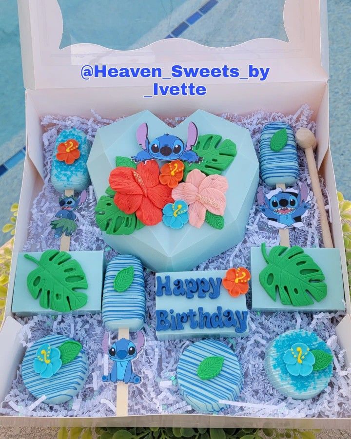 a birthday cake in a box with decorations