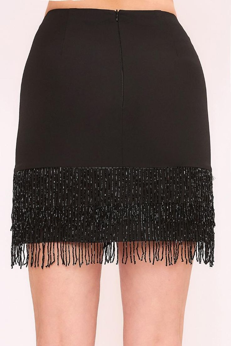 Boogie down in this jewel-encrusted fringe skirt. Move and shake in style with this sleek black skirt that's adorned with sparkly gems. Bedazzle the crowd with your funky moves! Black Woven Lined High-low hem Jewel fringe Zipper closure Jewel Encrusted, Black Weave, Black Jewel, Fringe Skirt, New Arrival Dress, High Low Hem, Black Skirt, High & Low, High Low