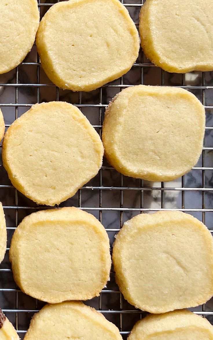 some cookies are cooling on a wire rack