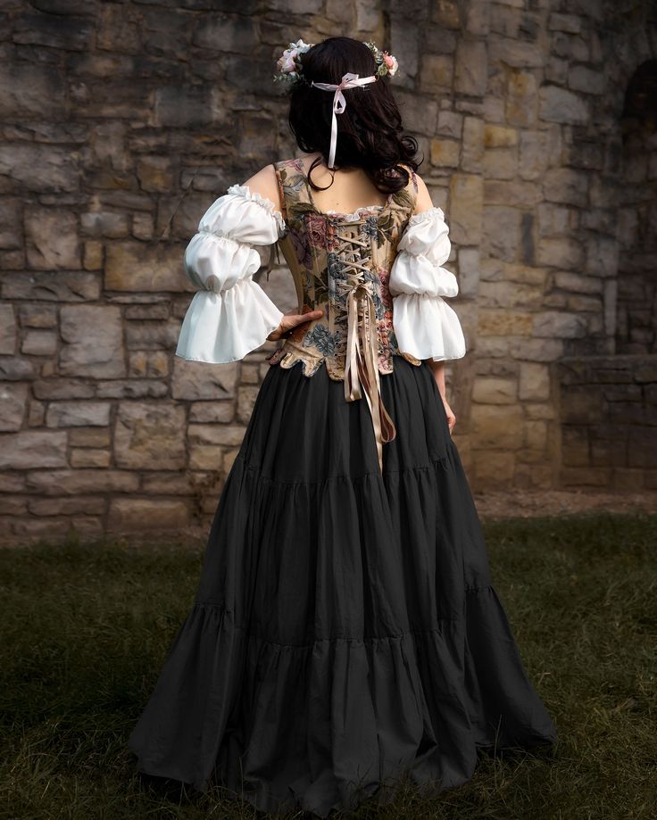 New To Our Fantasy Renaissance/Cottage Core Dress Costumes Line!This is a dress that can be worn to Renaissance Faires, where you will be the center of attention, or as regular Cottage Core wear with its soft and feminine appeal. The Josephine costume includes:1. Truffle tone tiered cotton voile skirt with lots of fabric for a full look.2. Smocked full length poly-crepe chemise with long sleeves. The skirt is 38” longThe dress is 55” from shoulder to hem. The smocked waist expands to a comfortab Medieval Dress With Historical Design For Festival, Bohemian Fitted Medieval Dress For Festivals, Bohemian Style Medieval Dress For Festivals, Bohemian Fitted Medieval Dress, Fitted Medieval Dress For Fantasy Events And Festivals, Fitted Medieval Dress For Cosplay, Medieval Festival Corset Dress With Fitted Bodice, Medieval Festival Dress With Fitted Bodice And Overbust, Medieval Dress With Fitted Bodice For Medieval Festivals