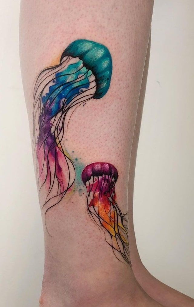 colorful jellyfish tattoo on the leg