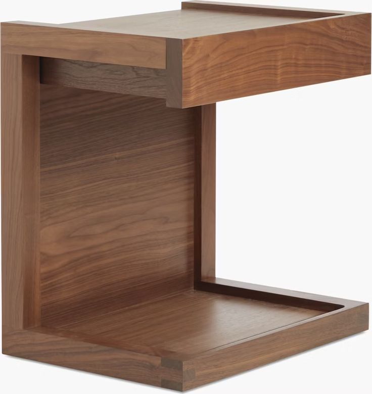 a wooden table with an open drawer on the bottom and one shelf in the middle