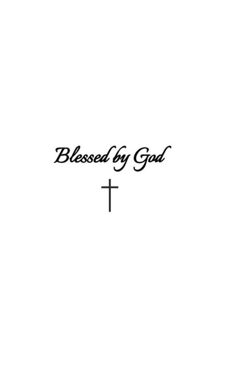 a cross with the words,'blessed by god'in black on a white background