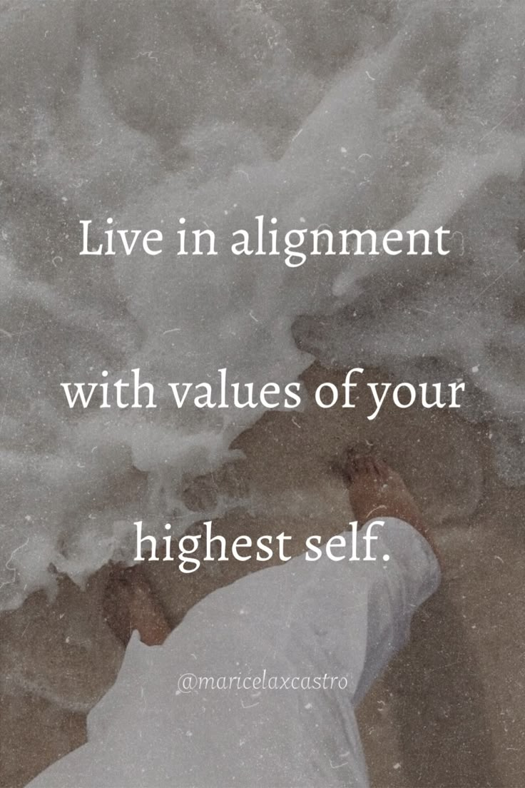 a person laying on the beach with their feet in the sand and text that reads, live in alignment with values of your highest self