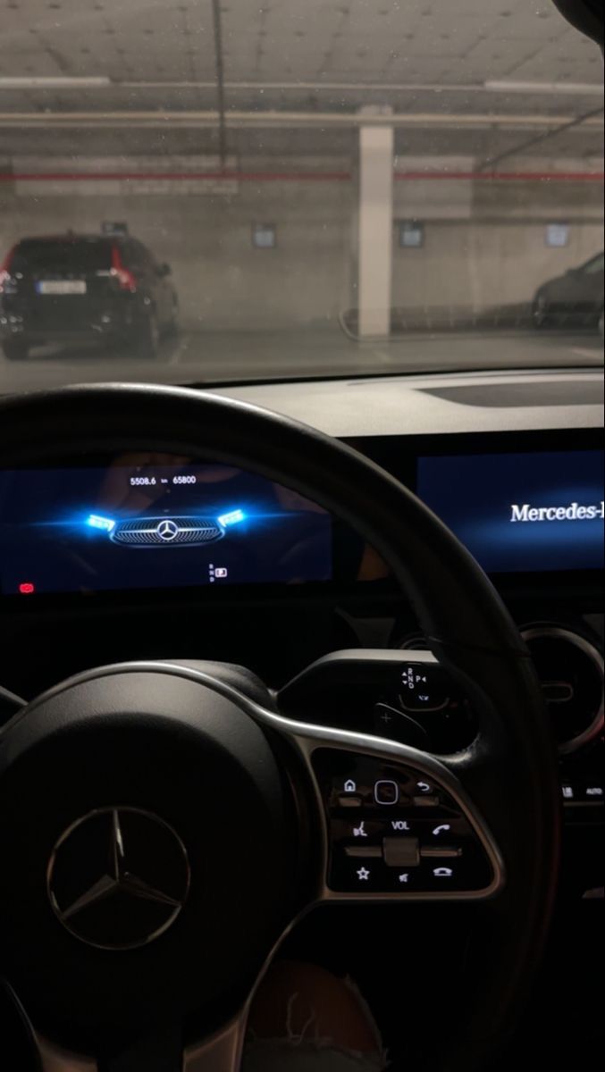 the inside of a car with an electronic screen