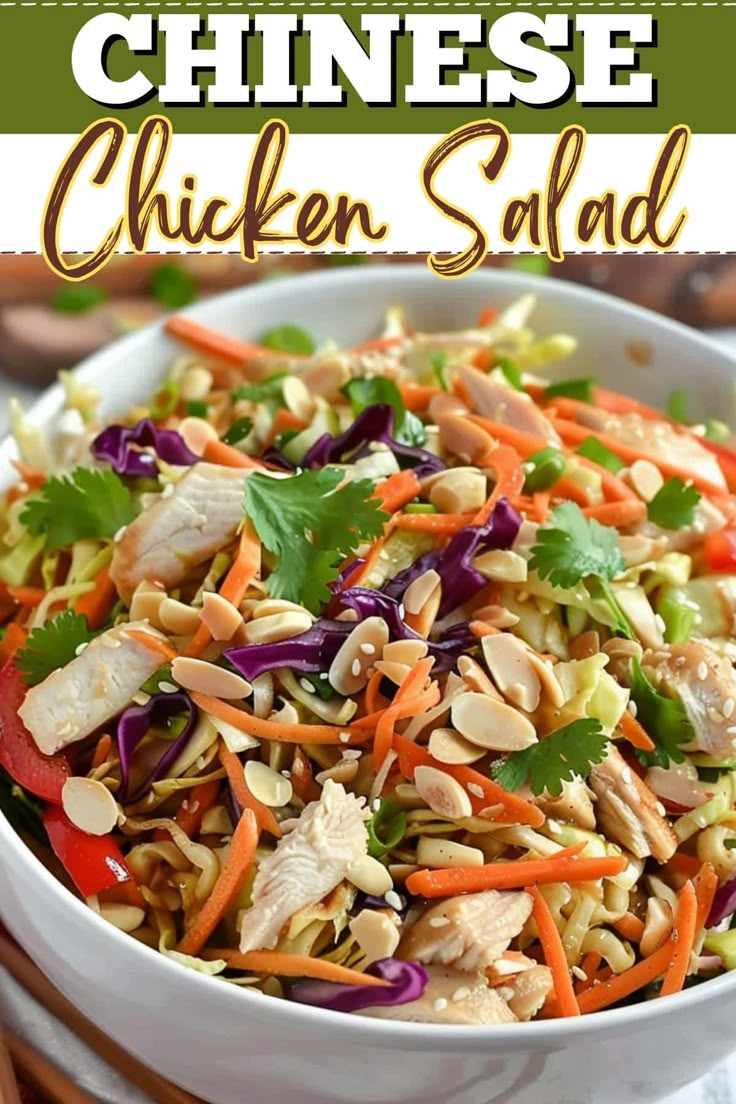 chicken salad in a white bowl with carrots and cilantro on the side