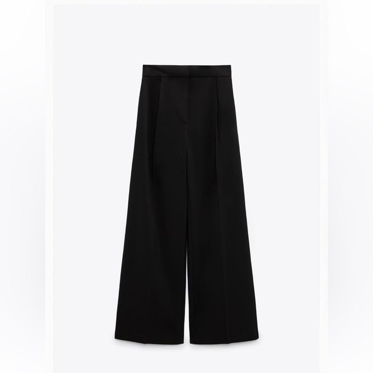 New With Tag Zara Black Wide Leg Menswear Style Pants Low Rise Pants Made Of Viscose Blend Fabric. Side Pockets And Back False Pockets. Flared Legs. Front Zip, And Metal Hook Closure. Approximate Measurement Size Medium: Waist 15”; Length 45.5” 1608/424 419 Zara Wide-leg Dress Pants With Pockets, Black Wide Leg Pants With Welt Pockets, Tailored Wide Leg Black Pants, Classic Zara Wide Leg Bottoms, High Waist Black Wide Leg Pants With Welt Pockets, Classic Black Wide Leg Pants With Pockets, Zara Classic Wide Leg Bottoms, Zara Wide Leg Dress Pants For Work, Business Black Wide Leg Pants With Pockets