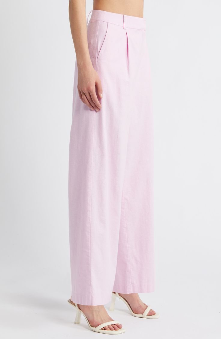 On-trend wide legs lend sophisticated drama to lightweight linen-blend pants designed with a crisp pleated front. 29" inseam; 20 1/2" leg opening; 12" front rise; 16" back rise (size 8) Zip fly with hook-and-bar closure Front slant pockets 53% linen, 44% rayon, 3% spandex Machine wash, tumble dry Imported Spring Modern Wide Leg Pants, Formal Cotton Wide Leg Pants With Relaxed Fit, Spring Full-length Linen Bottoms, Modern Wide Leg Pants For Spring Formal, Modern Wide Leg Pants For Formal Spring Events, Modern Formal Wide Leg Pants For Spring, Linen Full-length Pants For Spring, Spring Solid Wide Leg Full Length Pants, Modern High-waisted Wide Leg Pants For Spring