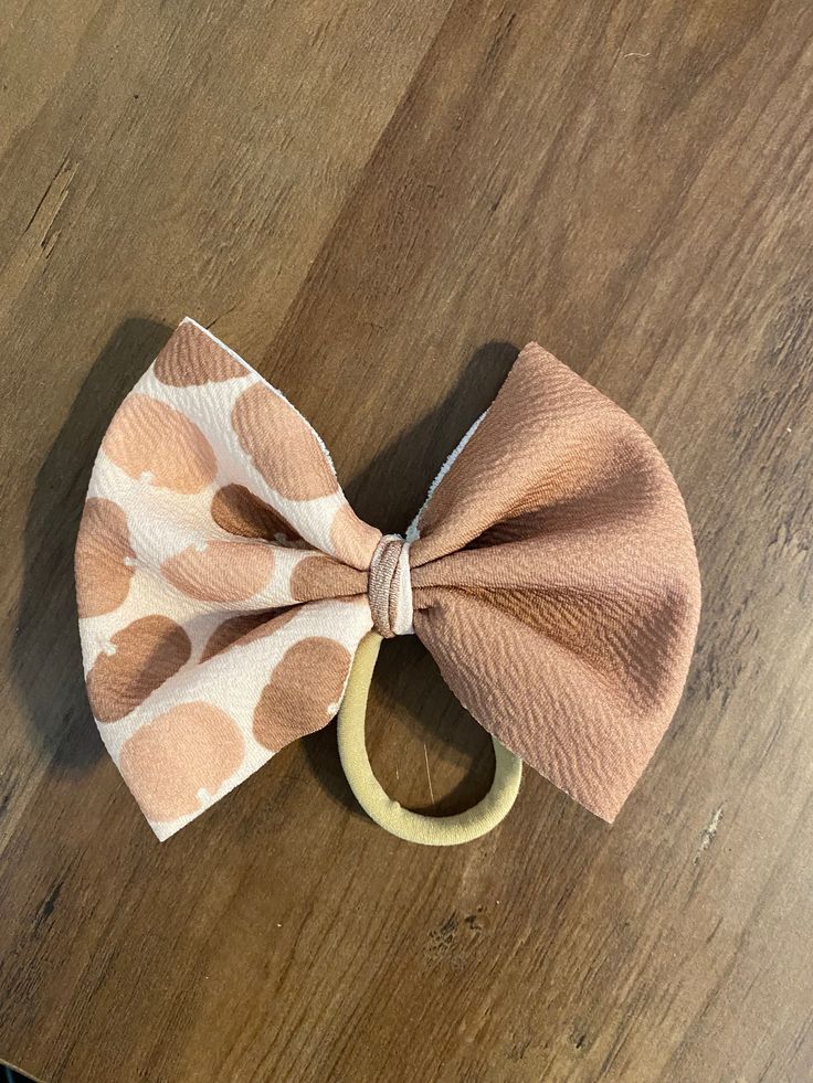 Nylon baby bow that is perfect for babies and toddlers! Playful Satin Bow For Gifts, Playful Satin Bow Gift, Playful Pink Satin Bow, Adjustable Playful Pink Bow, Playful White Decorative Bow, Adjustable Playful Bow For Playtime, Baby Bow, Baby Bows, Hair Accessories Headbands