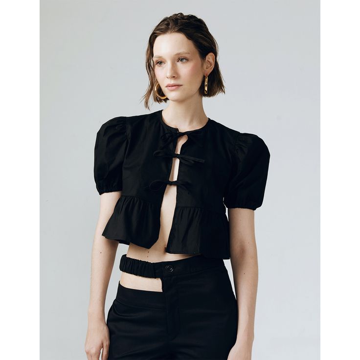 This crop top exuding flair and sophistication, ideal for elevating any ensemble with a dash of refined style.  How to Wear It: High-Waisted Bottoms: Pair with skirts or trousers. Layered: Wear under blazers or jackets. Accessorize: Add statement jewelry for a chic touch. Hand Wash Light Ironing Do Not Bleach Evening Cropped Top, Elegant Cropped Tops For Evening, Elegant Cropped Evening Tops, Modern Black Crop Top For Summer, Elegant Black Cropped Top, Cropped Summer Evening Blouse, Elegant Black Crop Top, Cropped Evening Blouse For Summer, Summer Evening Cropped Blouse