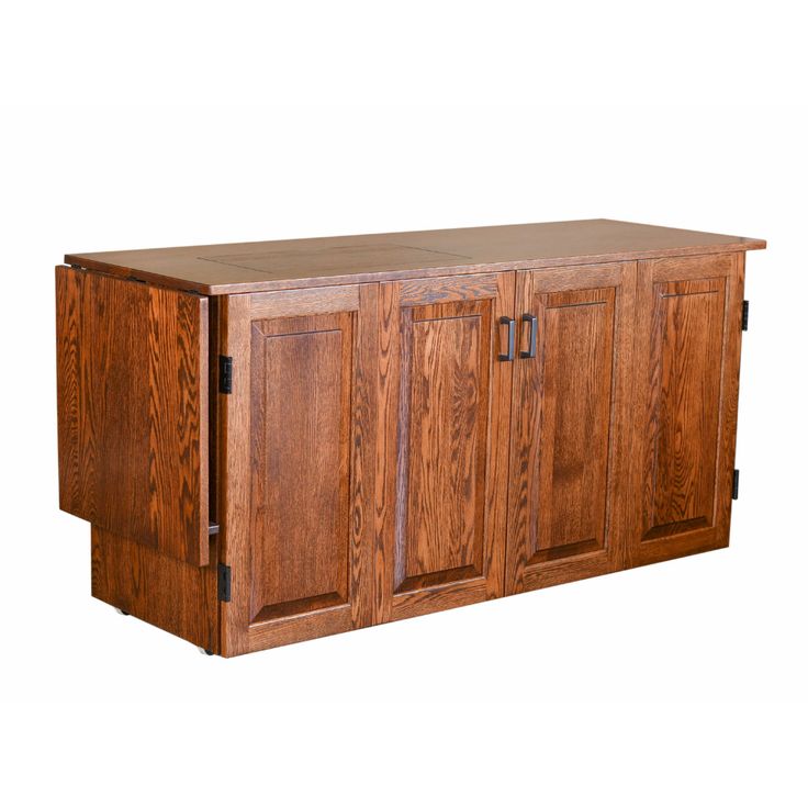 a large wooden cabinet with doors and drawers