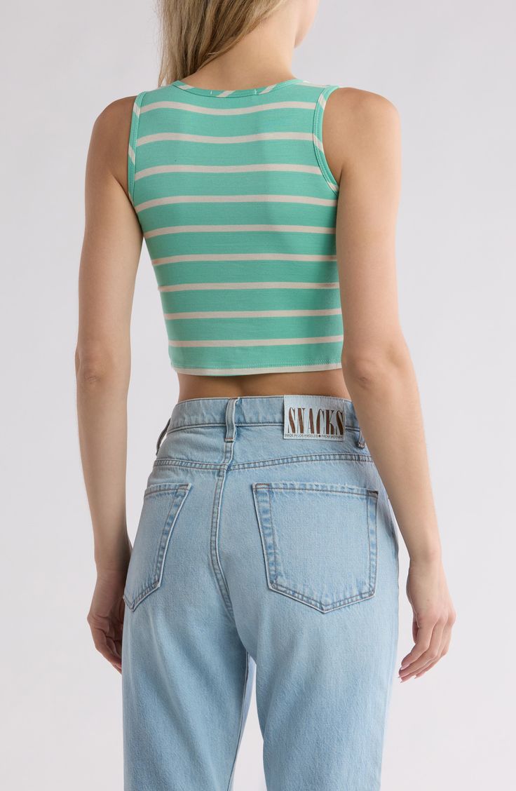 Horizontal stripes lend summertime charm to this soft and stretchy tank that's sure to be a go-to on warmer days. 15" length (size Small) Crewneck Sleeveless 95% nylon, 5% spandex Machine wash, dry flat Made in the USA Trendy Striped Sleeveless Crop Top, Summer Sleeveless Crop Top For Everyday, Summer Style Sleeveless Crop Top For Everyday, Casual White Tank Top With Contrast Stripes, Sleeveless Cotton Tank Top With Contrast Stripes, Cotton Sleeveless Tank Top With Contrast Stripes, White Summer Tops With Vertical Stripes, Striped Fitted Tank Top With Tank Straps, Summer Racerback Crop Top For Everyday