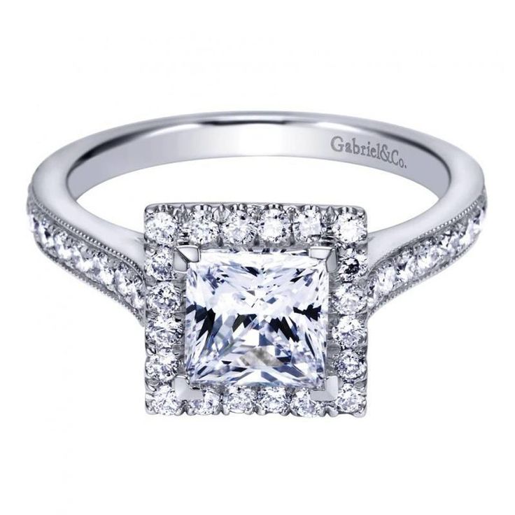 a princess cut diamond engagement ring set with pave diamonds on the shoulders and sides