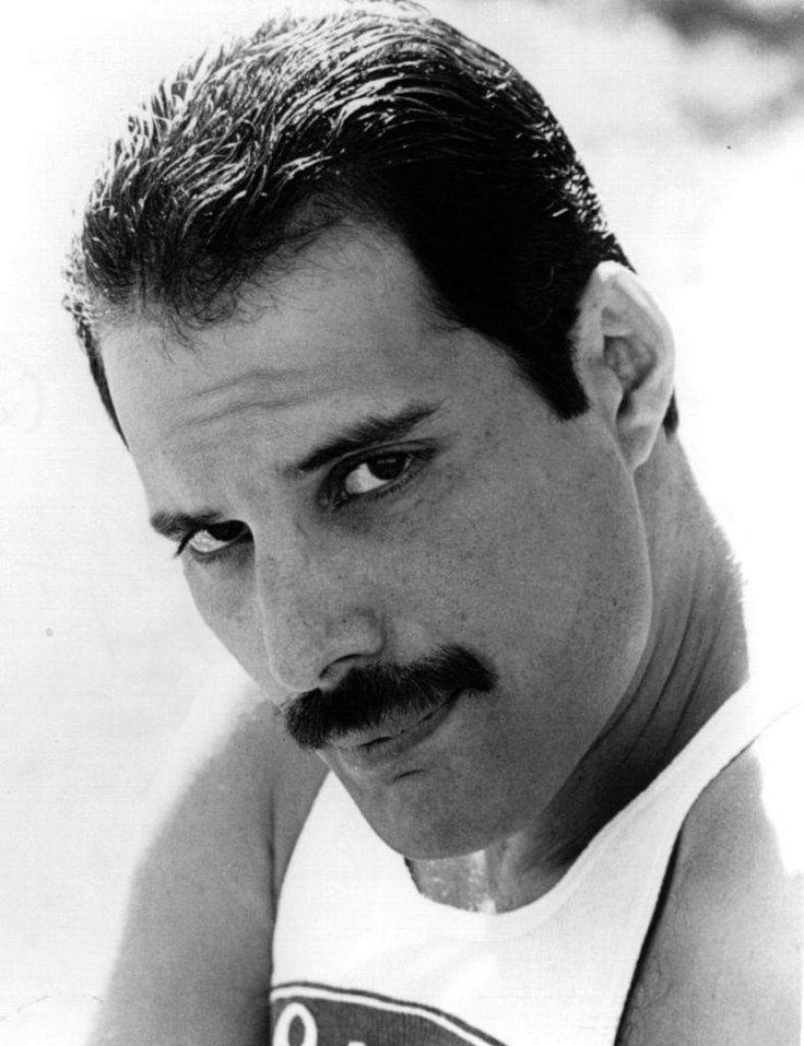 black and white photograph of a man with a mustache